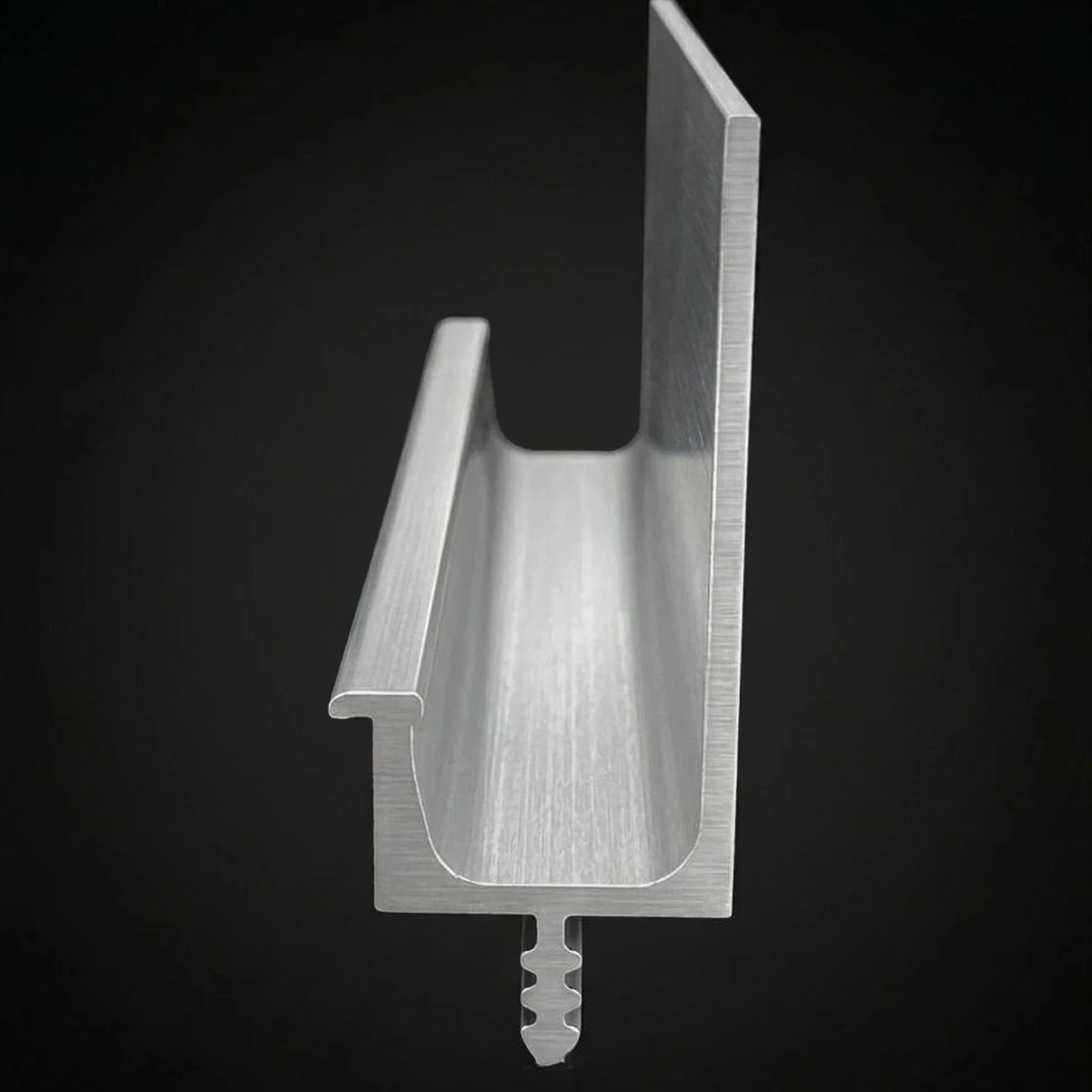 Slim J aluminium handle profile in brushed silver with a tall back lip and a ribbed stem