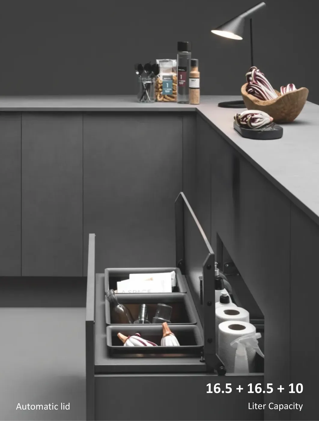 Mirano Movebin pull-out waste and utility system with automatic lid and 16.5 plus 16.5 plus 10 litre bins in a modern kitchen cabinet
